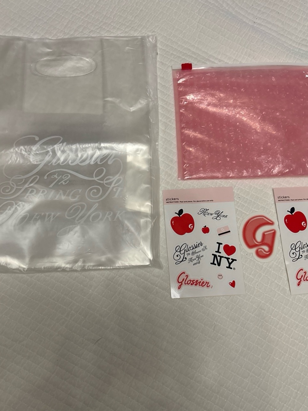 Glossier Clear Logo Bag with Pink Bubble Zip Pouch & Sticker Sheets